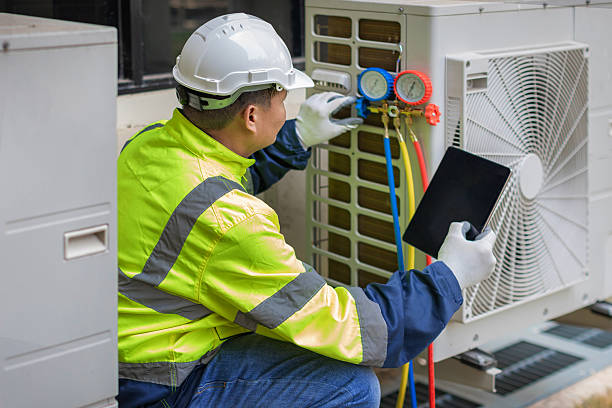 Professional Hvac technician working in Camp Lake, WI